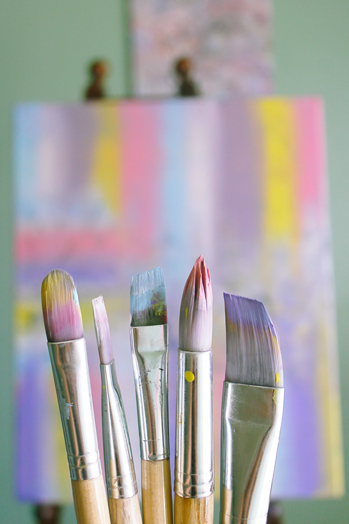 different paint brushes with paint