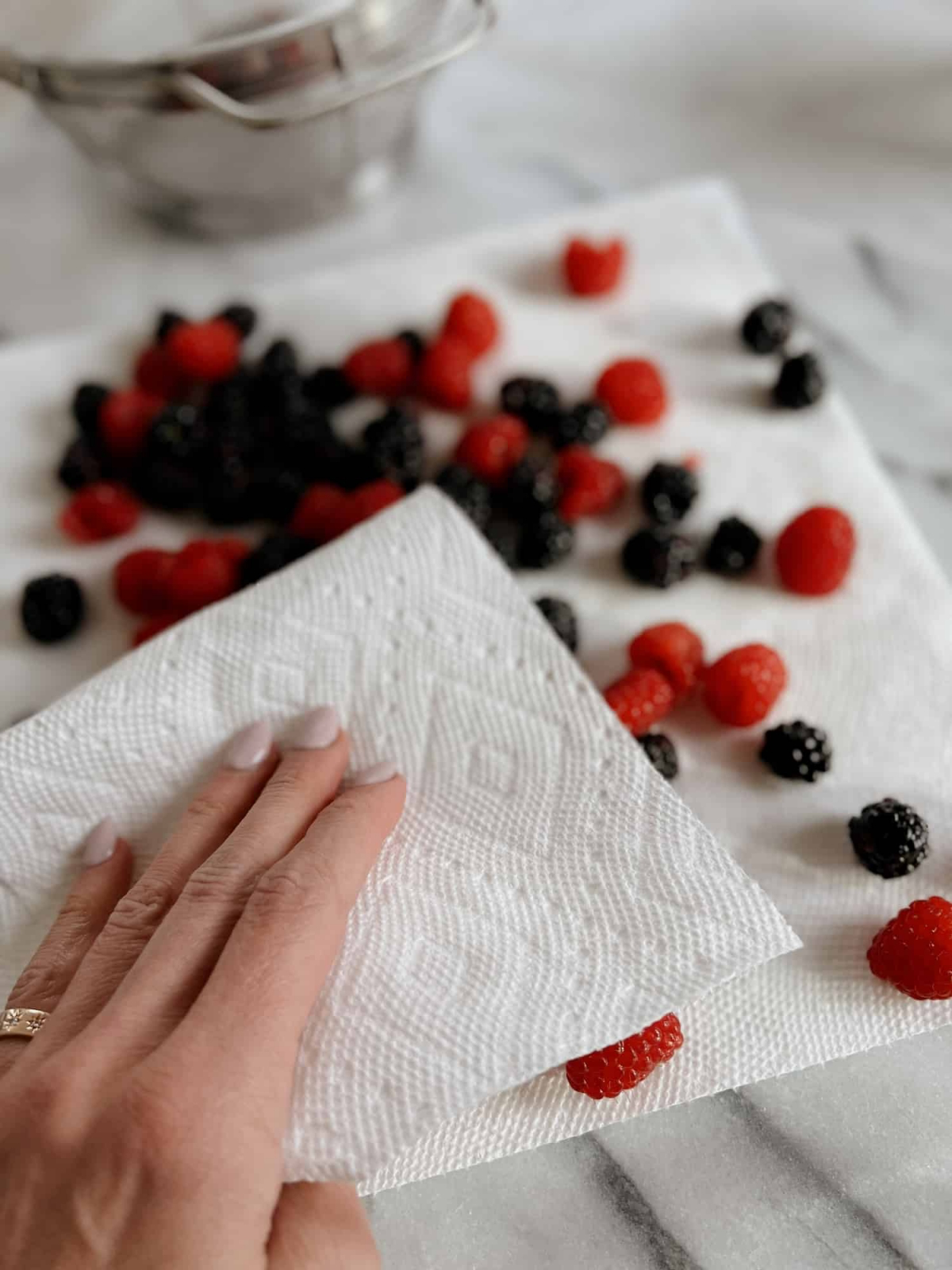 does washing berries do anything