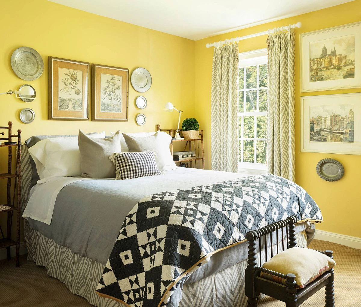 pastel yellow bedroom with big bed