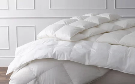pile of comforter on bed
