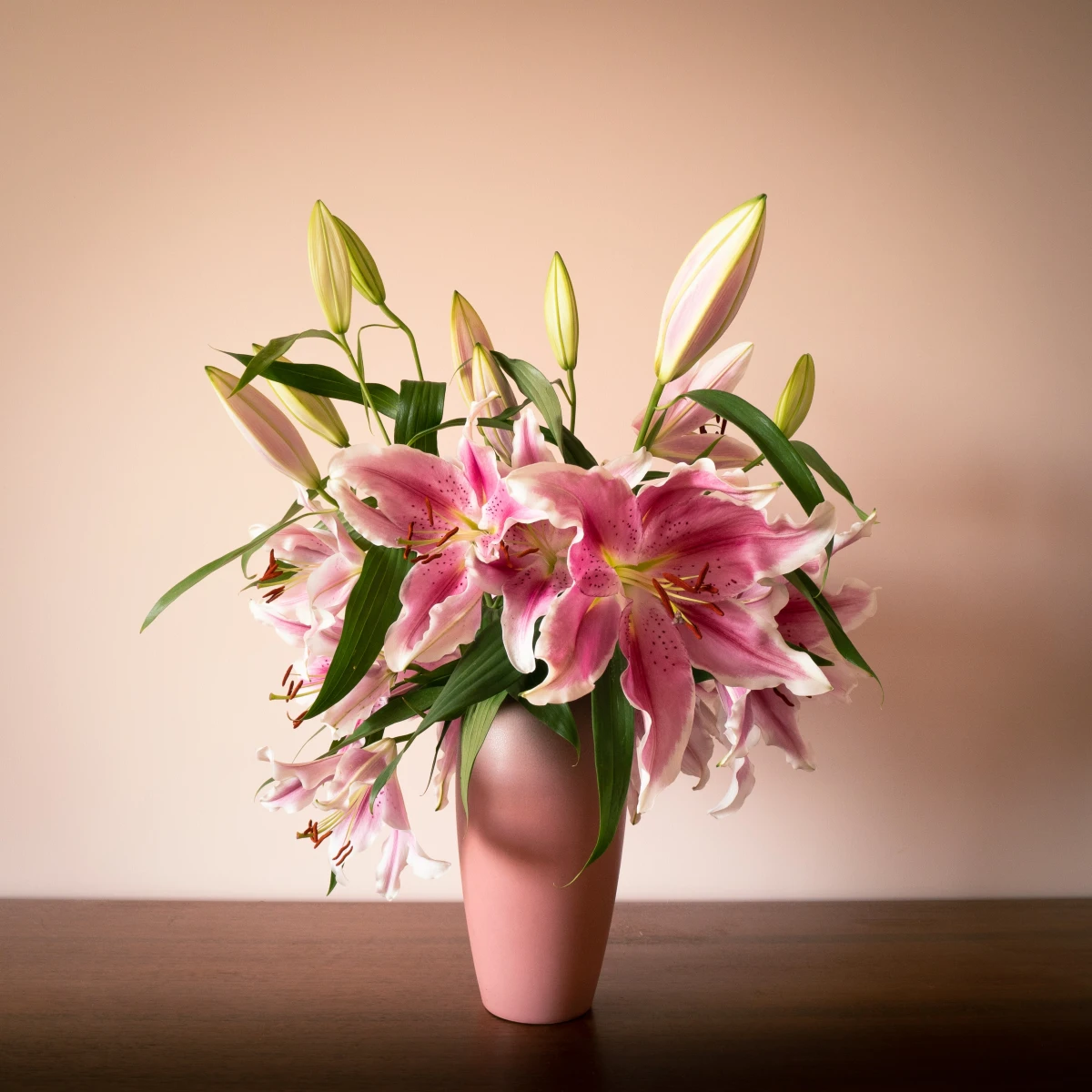 pink oriental lilies in a vase