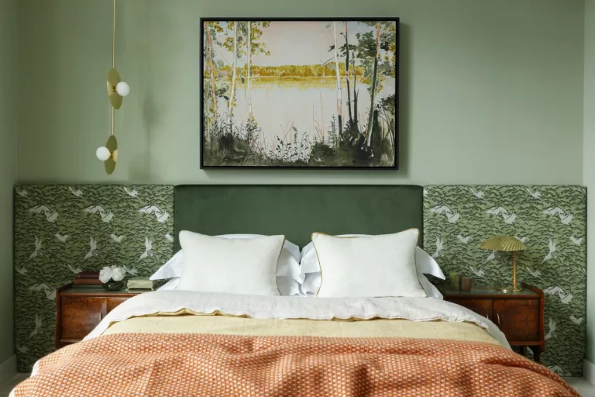 sage green bedroom with green bed