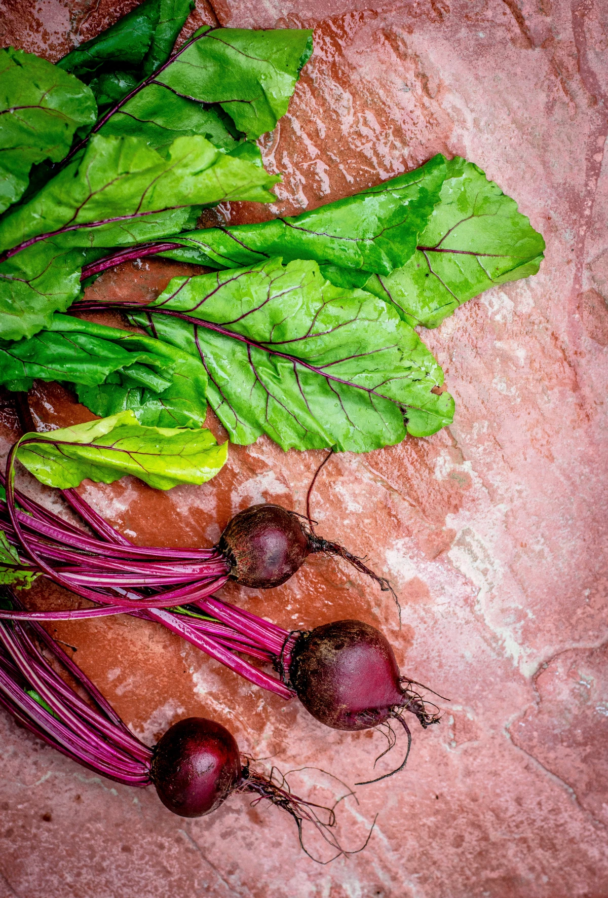 three red beets with leaves