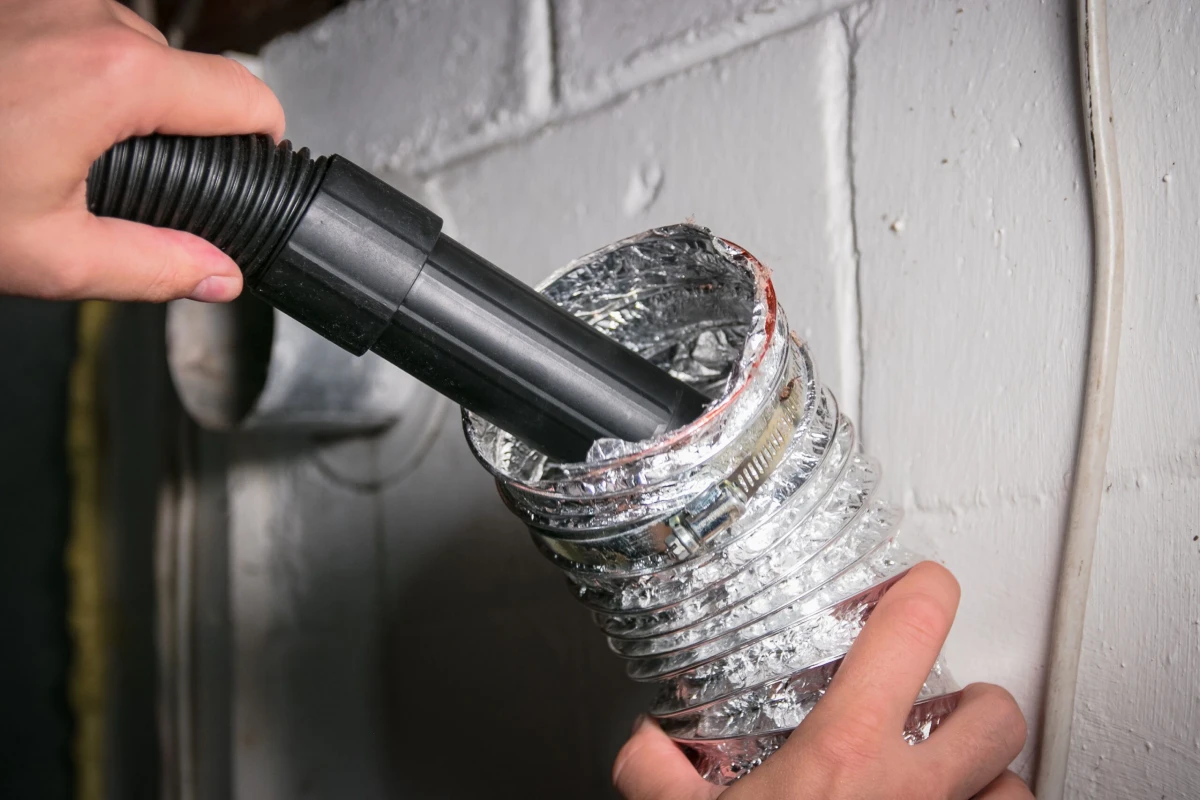 vacuuming inside of dryer vent