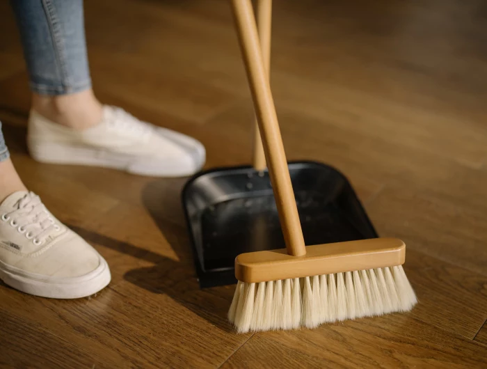 dirtiest places in your home person using a broom