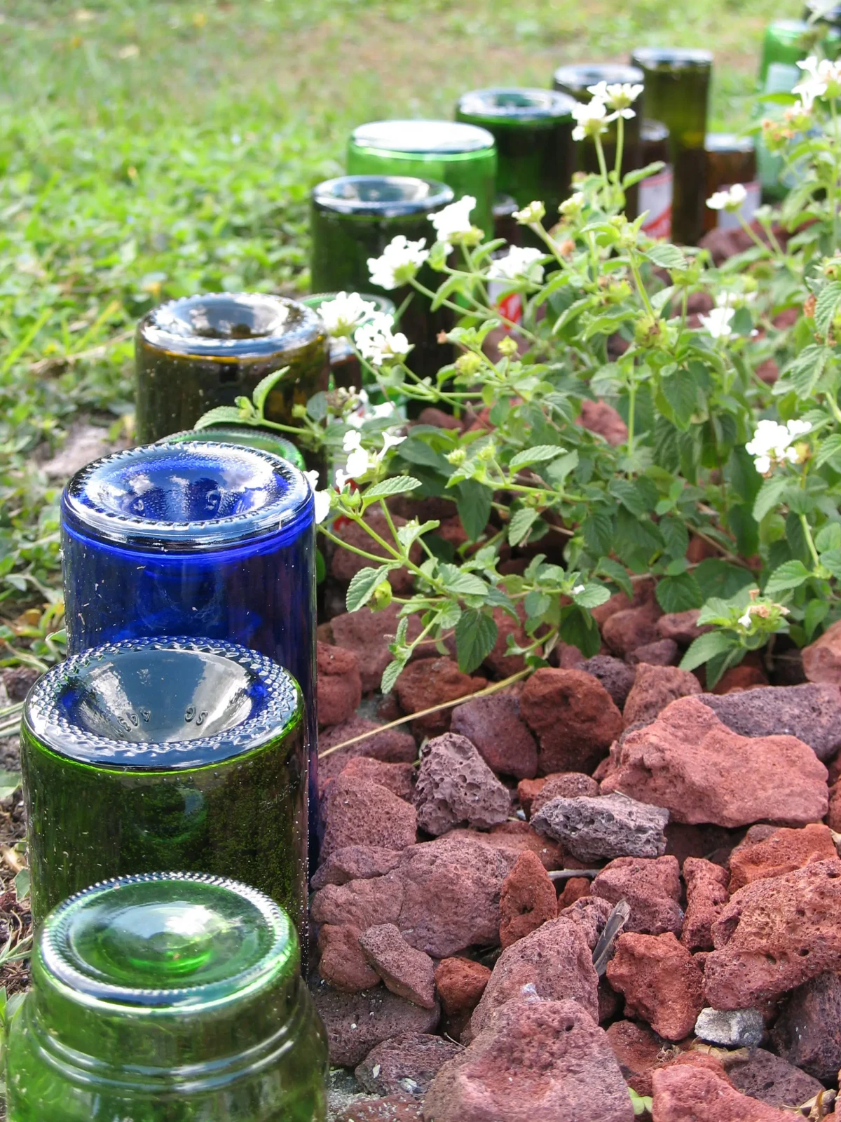 garden border made with glass bottles