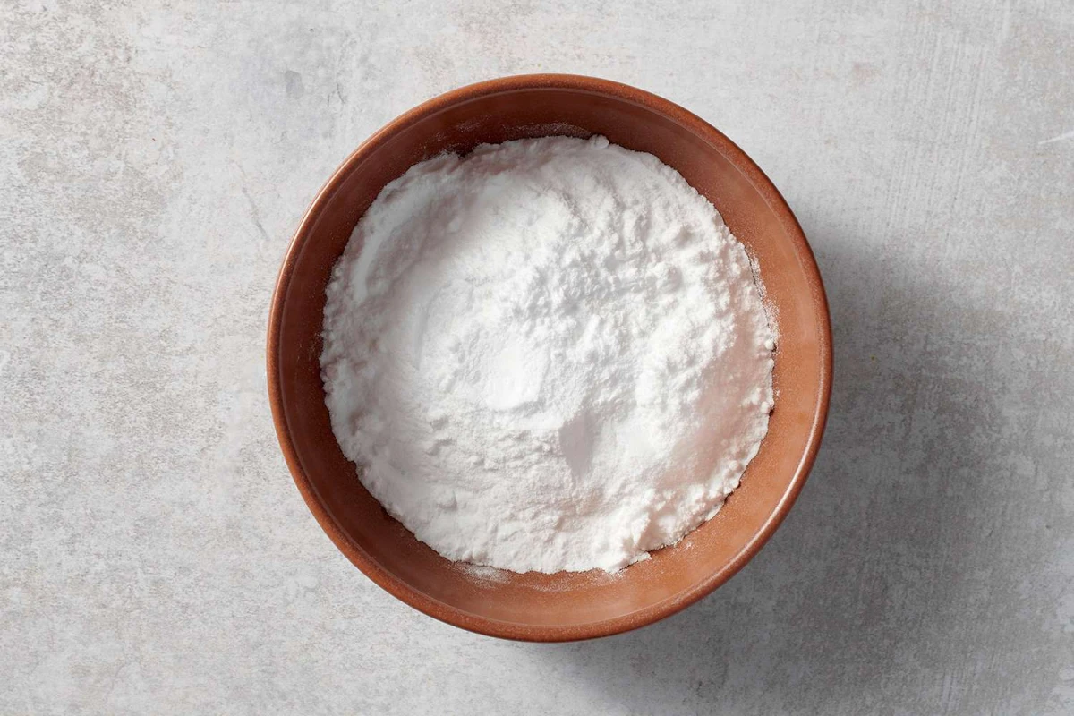 how to brighten white clothes baking soda in wooden bowl