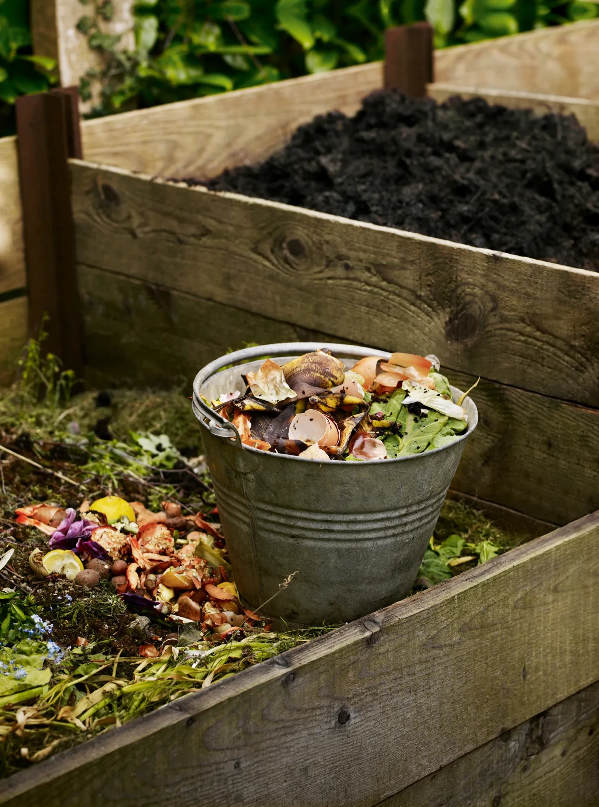 how to compost at home bucket of compost filled