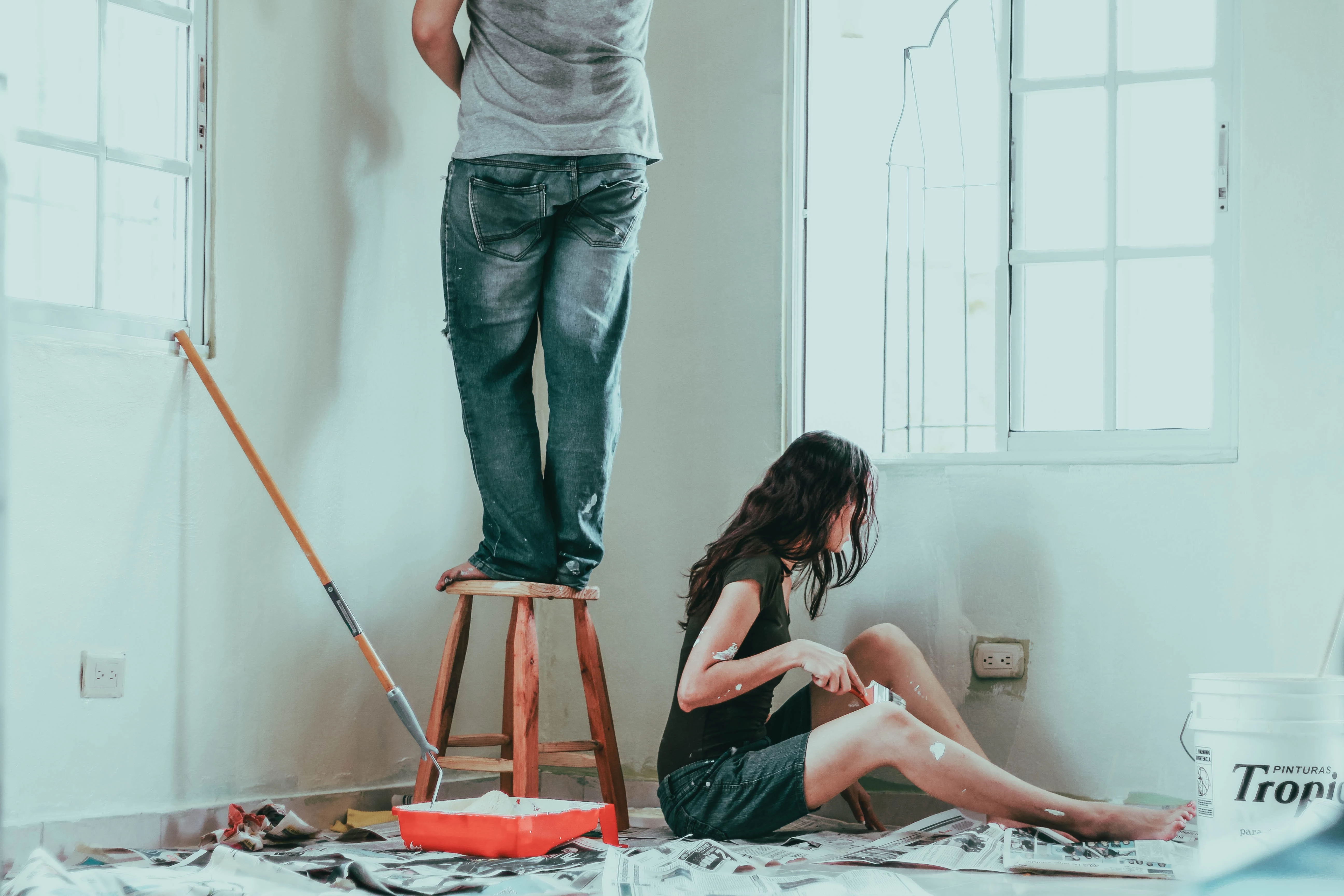 man and woman renovating their home