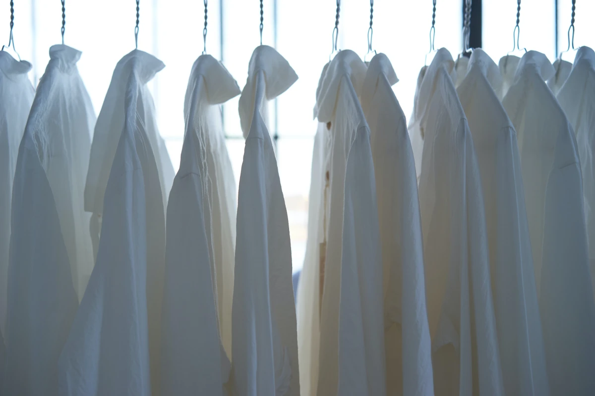 white shirts on a rack