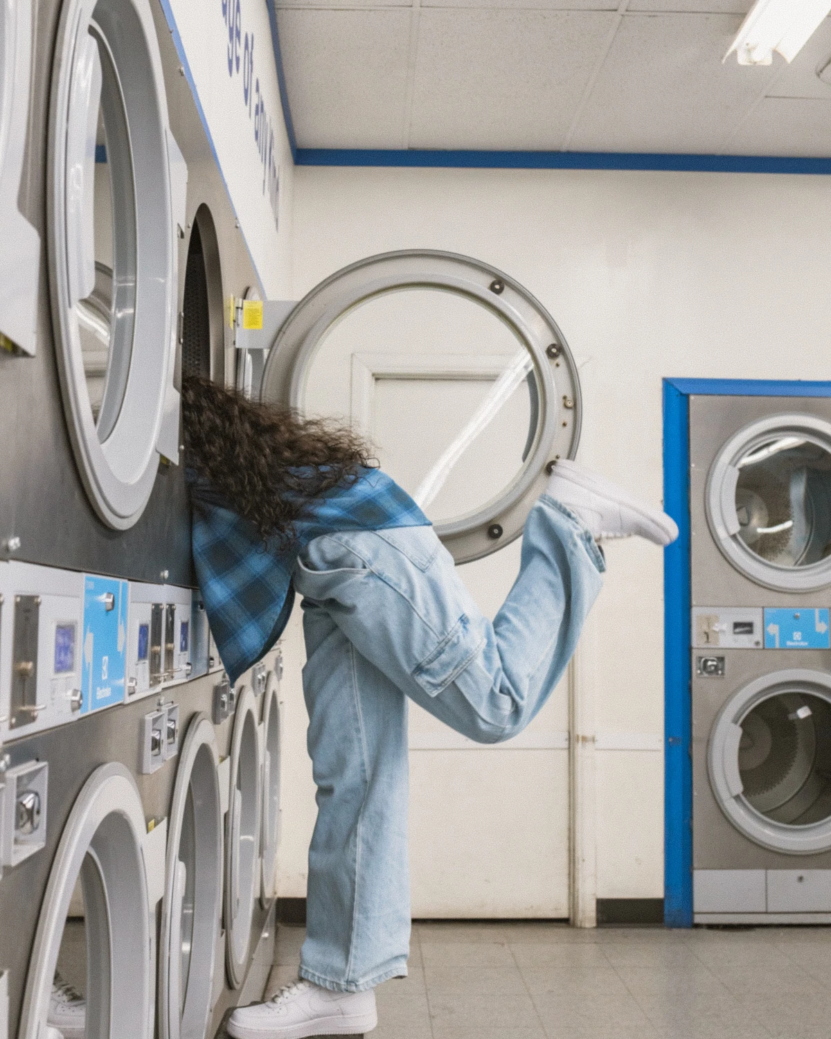 woman in a washing machin