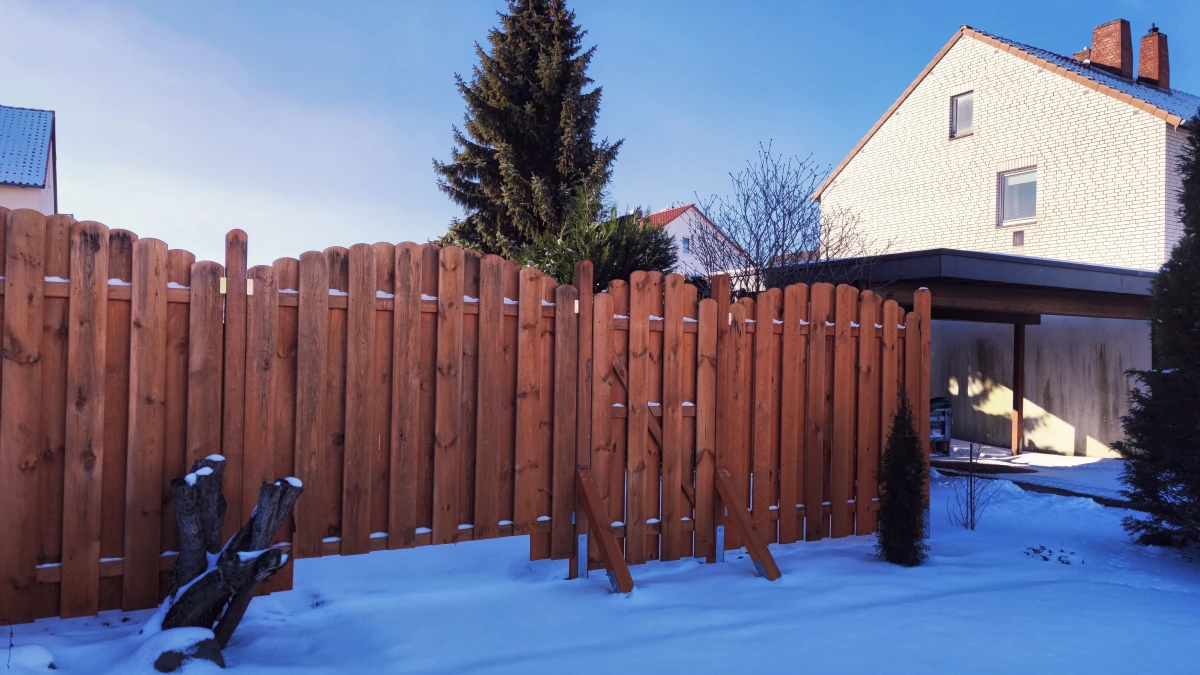 brown fence in winter