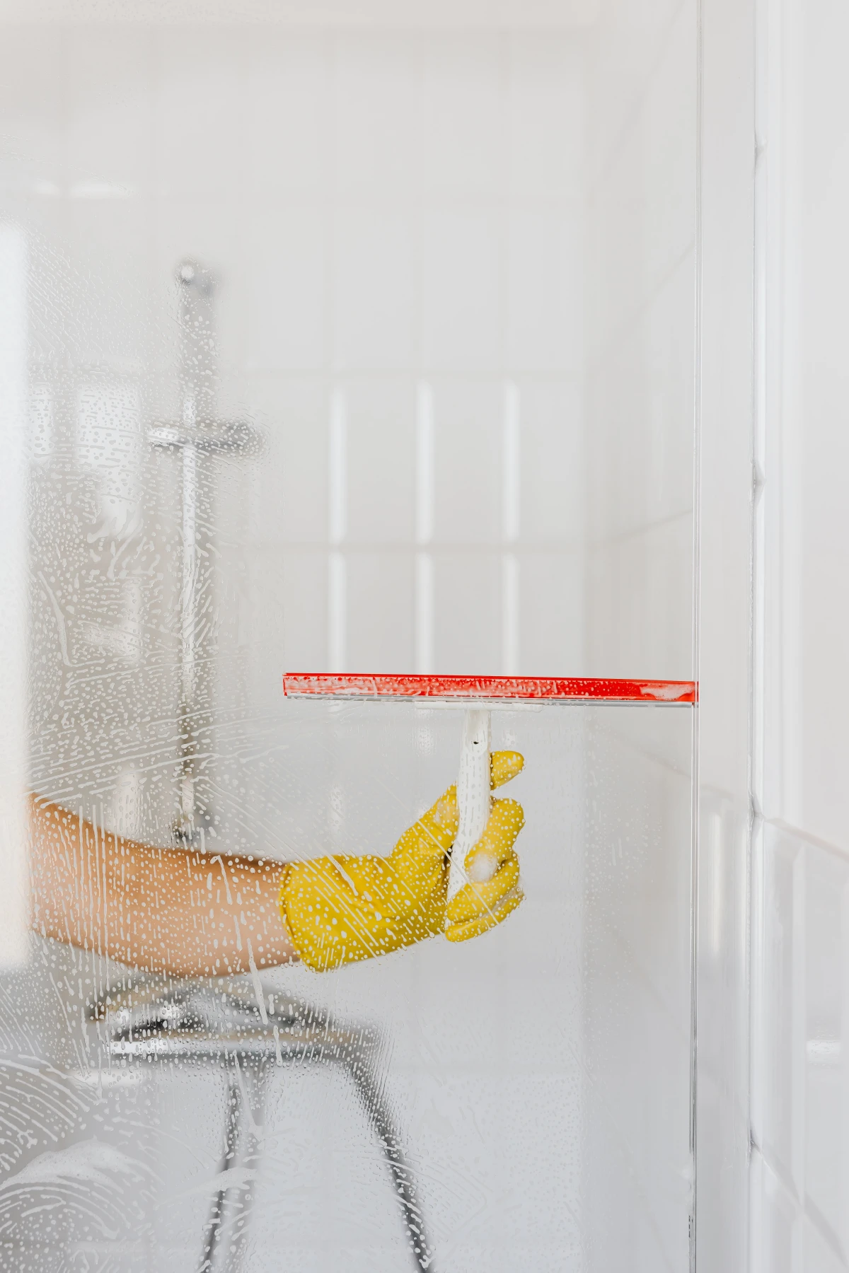 cleaning bathroom glass