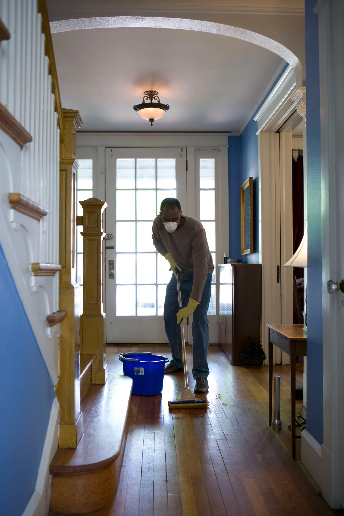 man cleaning corrdior