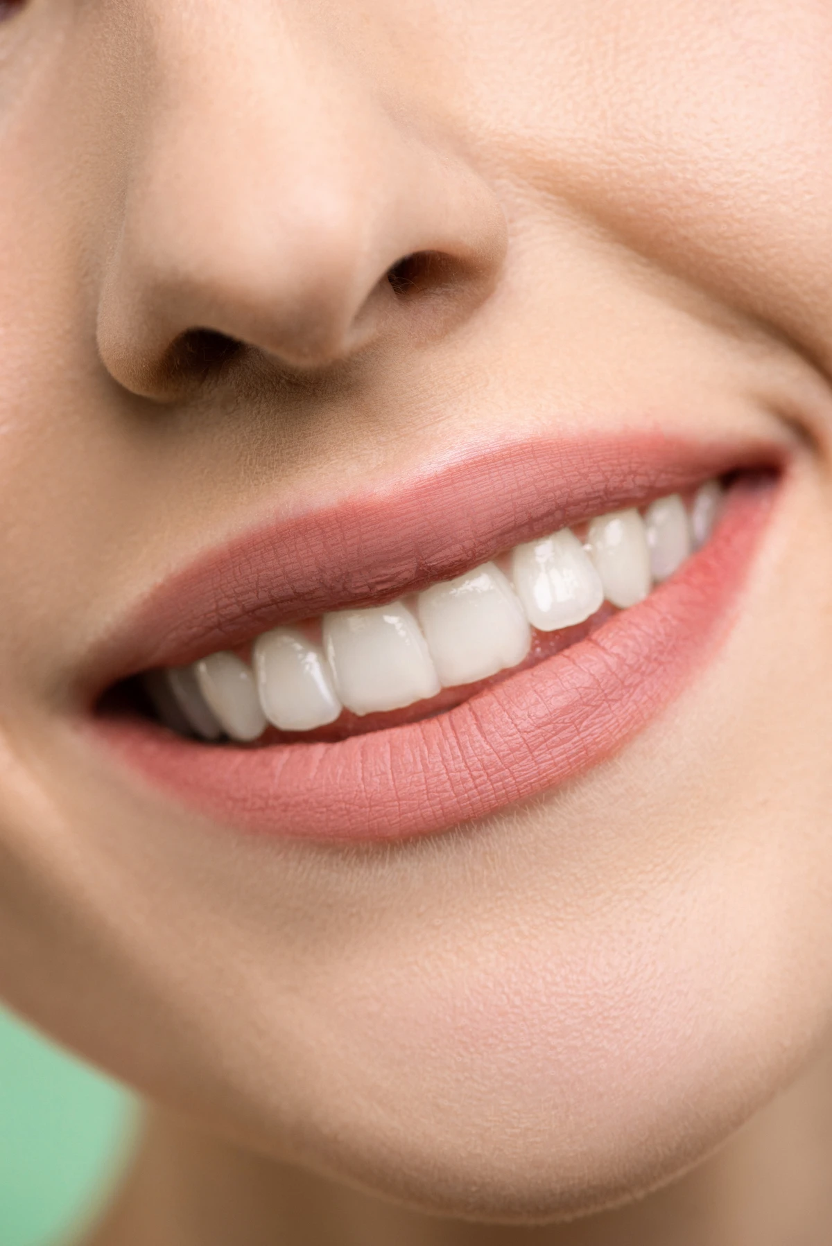 bentonite clay benefits woman smiling with white teeth