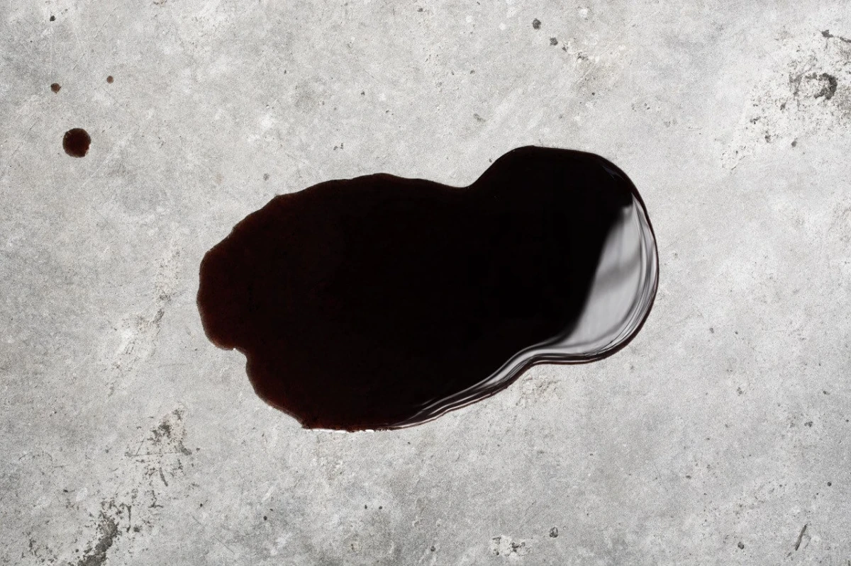 black oil stain on ground