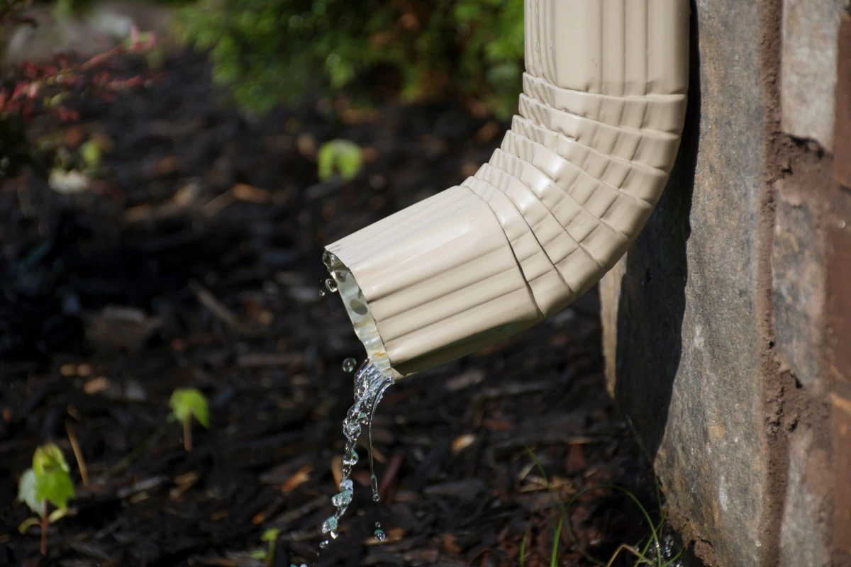 downspout with water