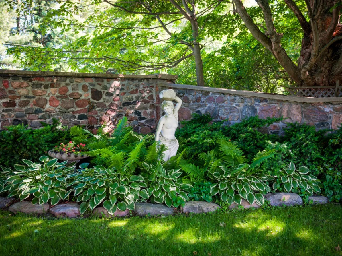 shady garden with statue