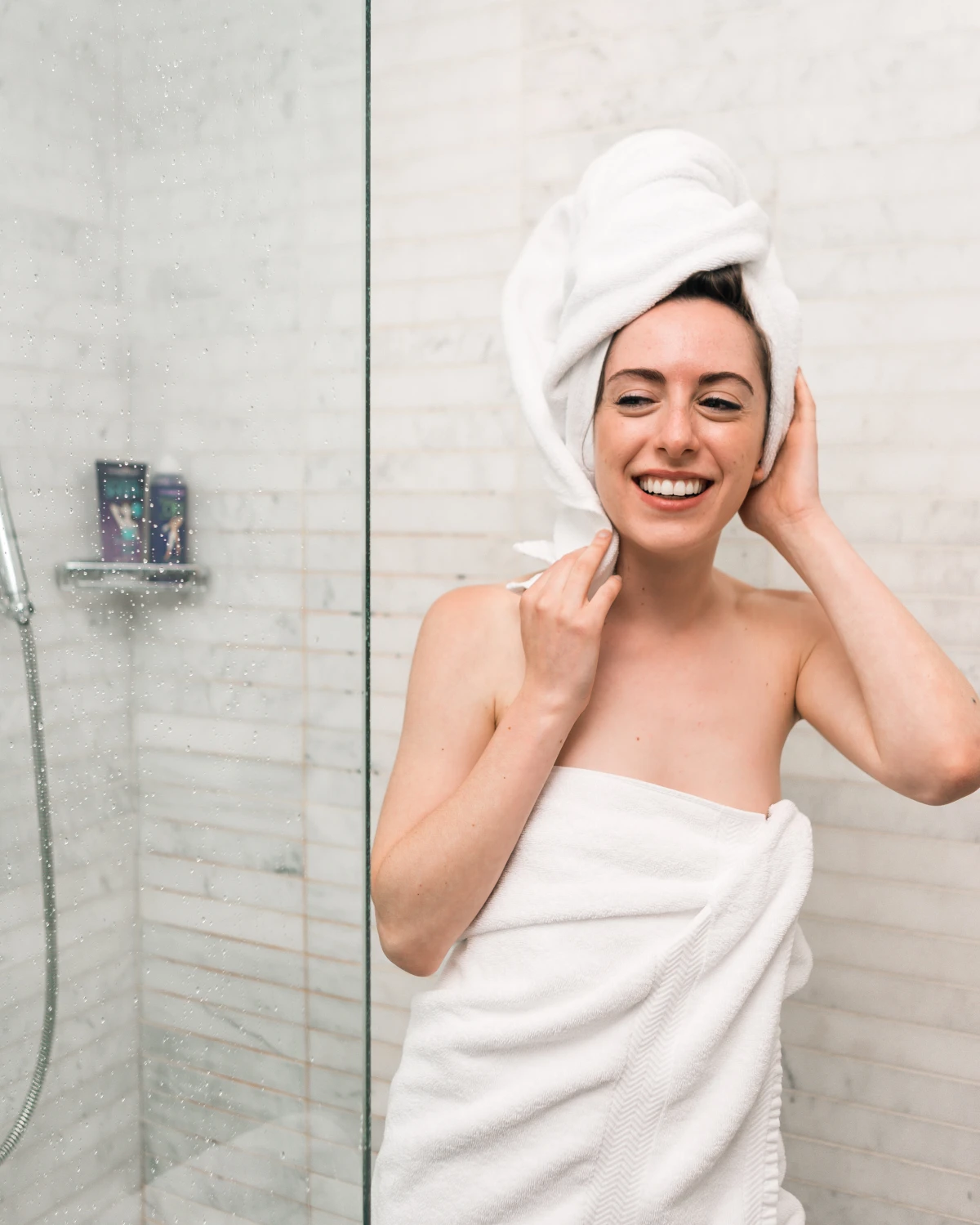 woman out of the shower smiling