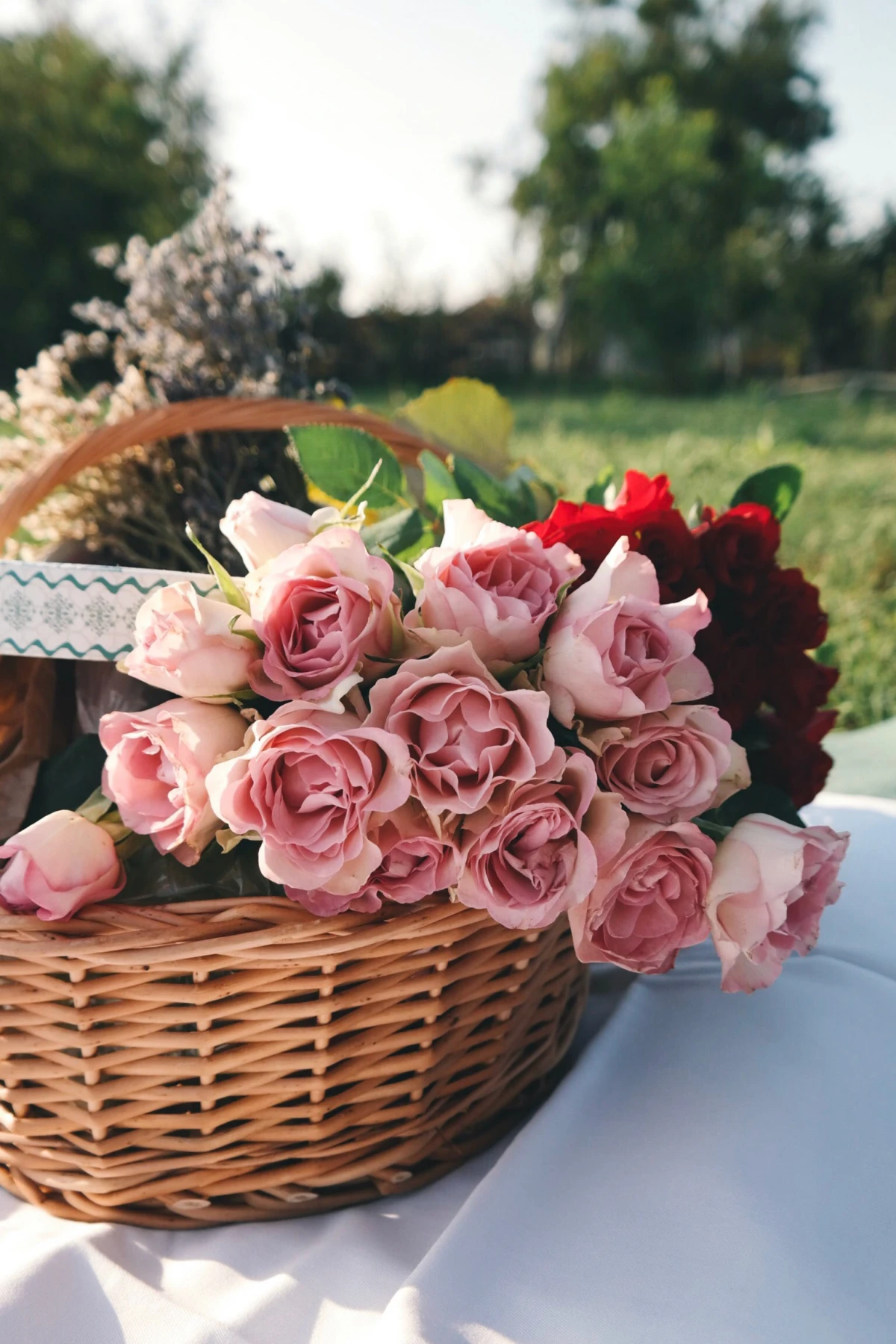 woven basket with pink roses