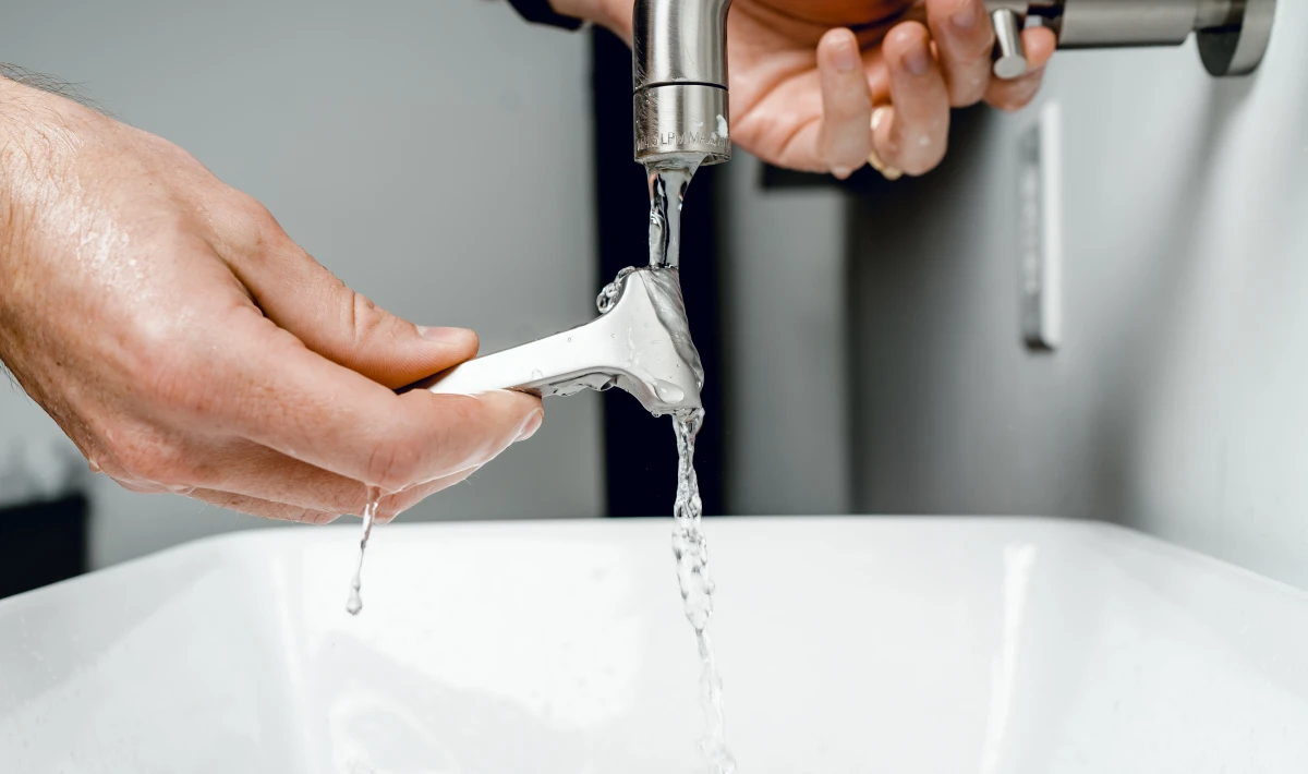 make your shaving razors last longer person washing razor