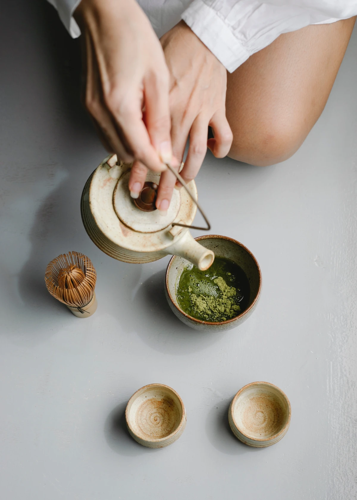 making matcha tea with teapot