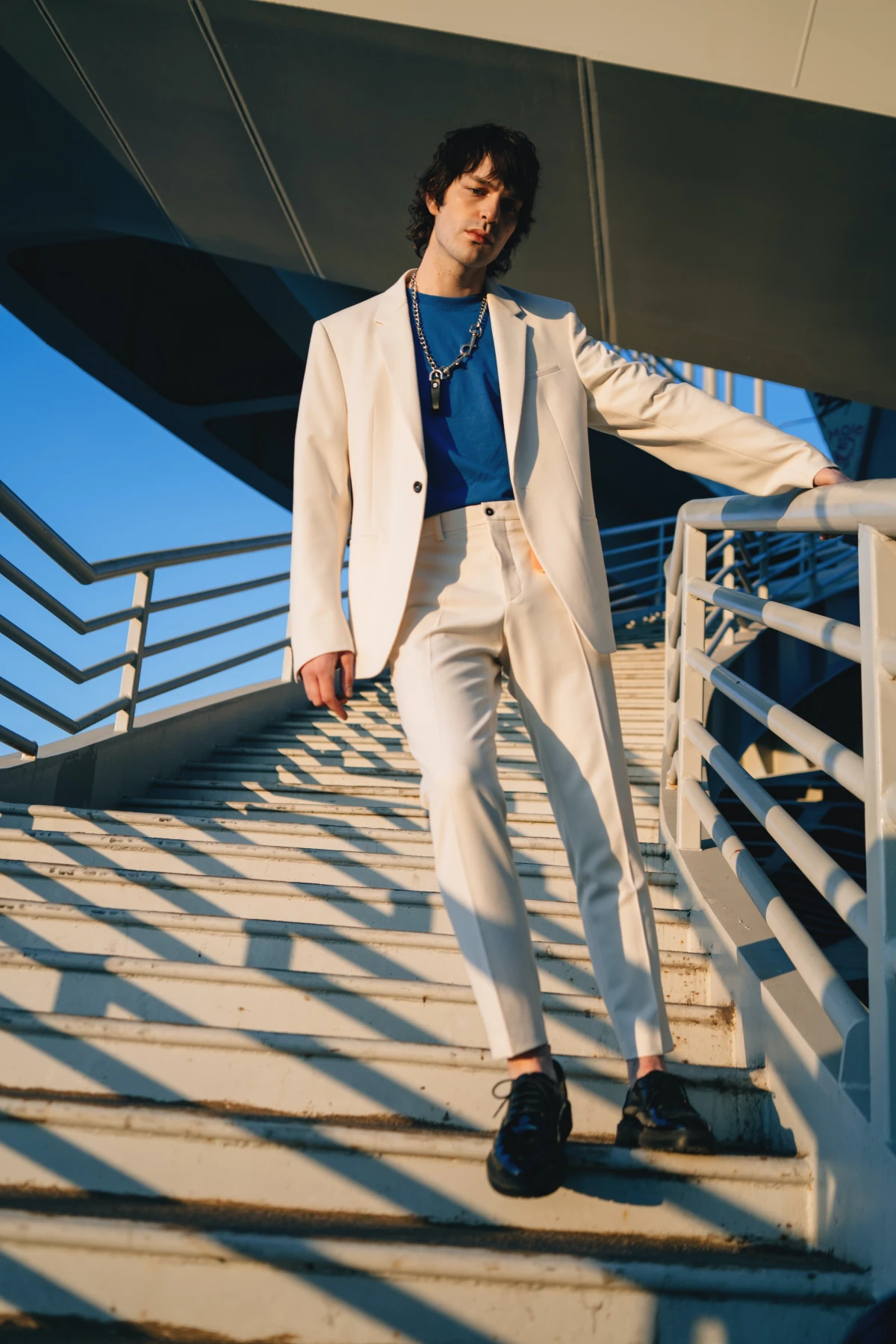 man with white suit