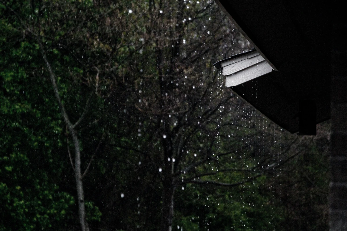 rain dripping from side of home