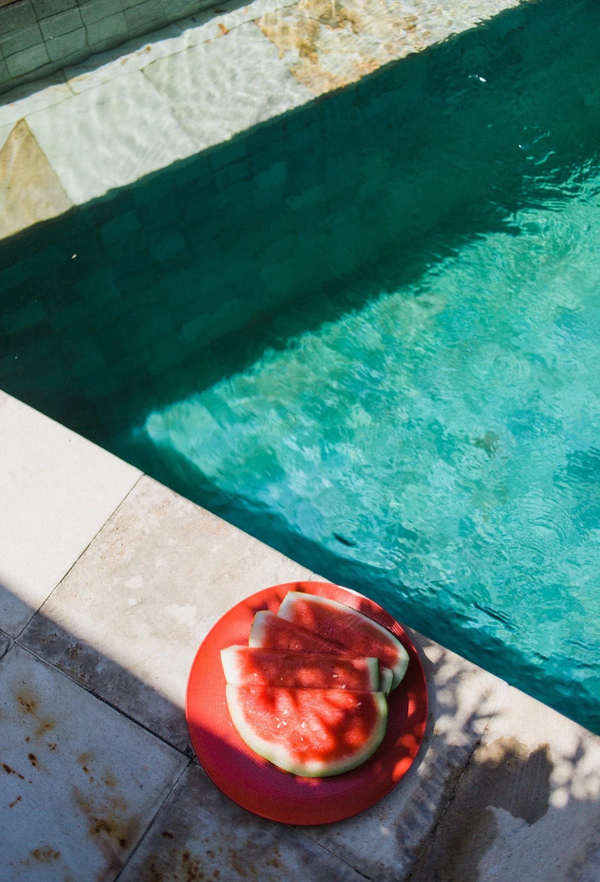 watermelon slices by the pool