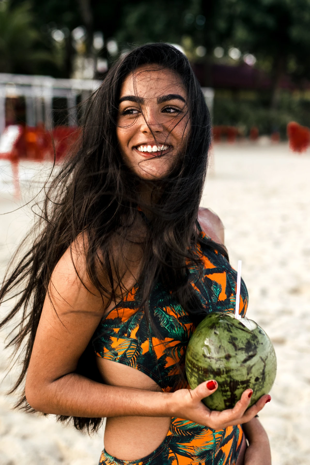 woman drinking coconut water