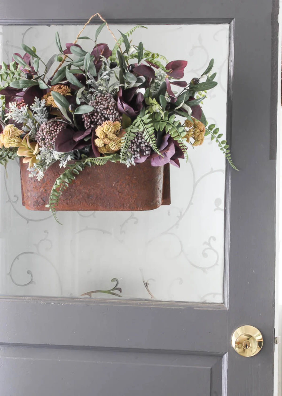 fall front door decor planter with fall flowers