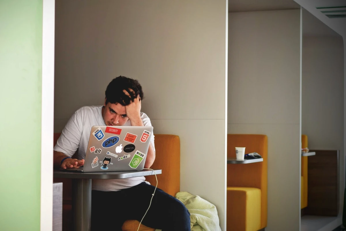 man in front of laptop