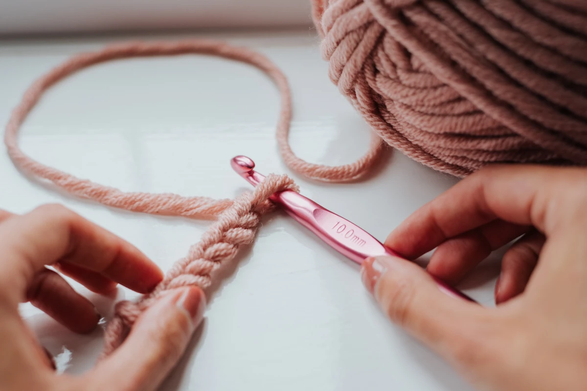 slow living hobbies person crocheting