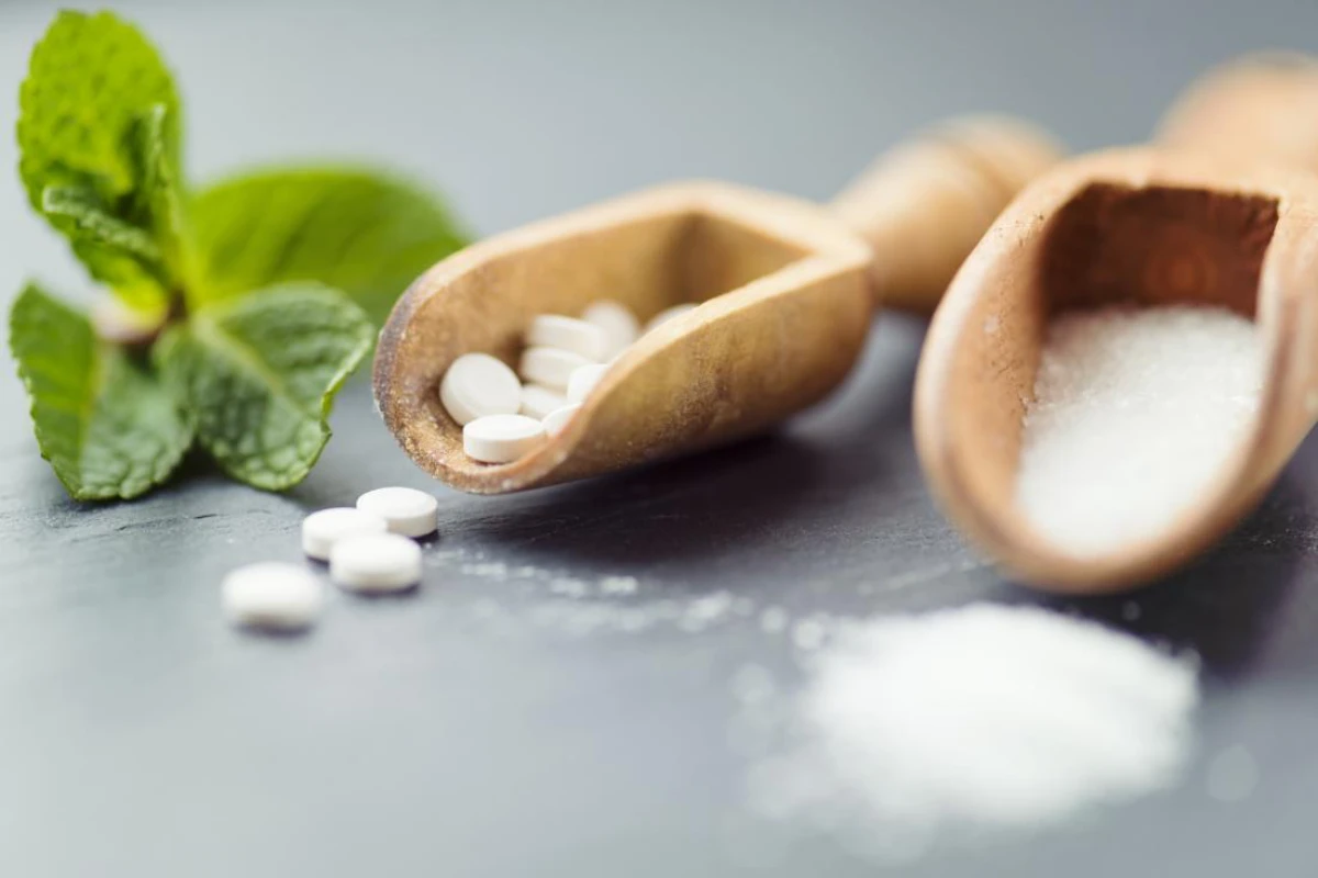xylitol sweetener on wooden spoons