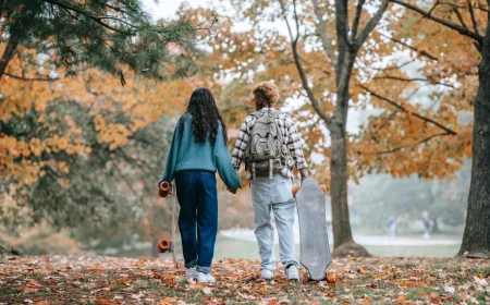 fall activities couple during fall with skateboard