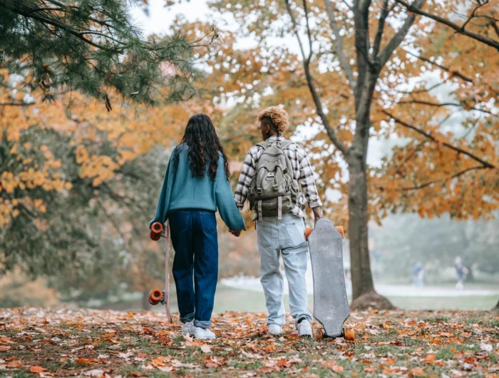 fall activities couple during fall with skateboard