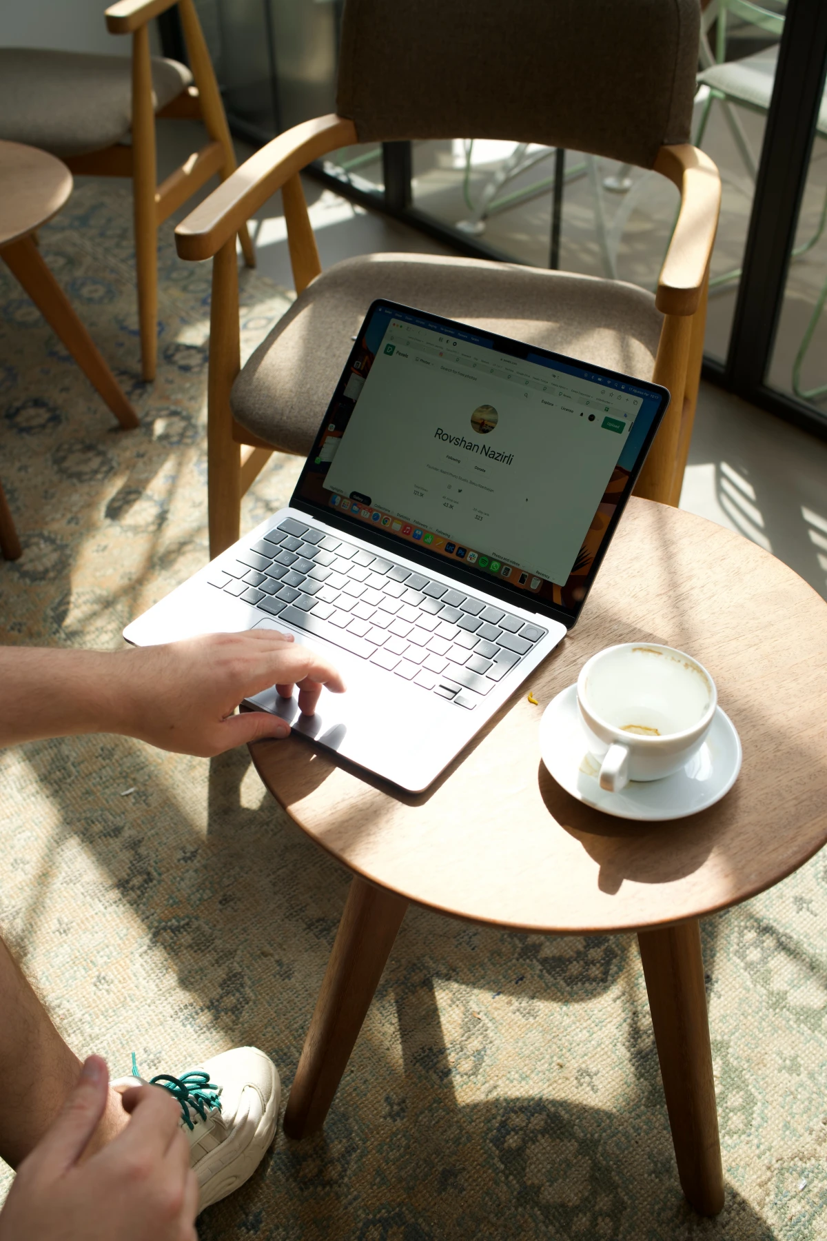 laptop and coffee cup on table
