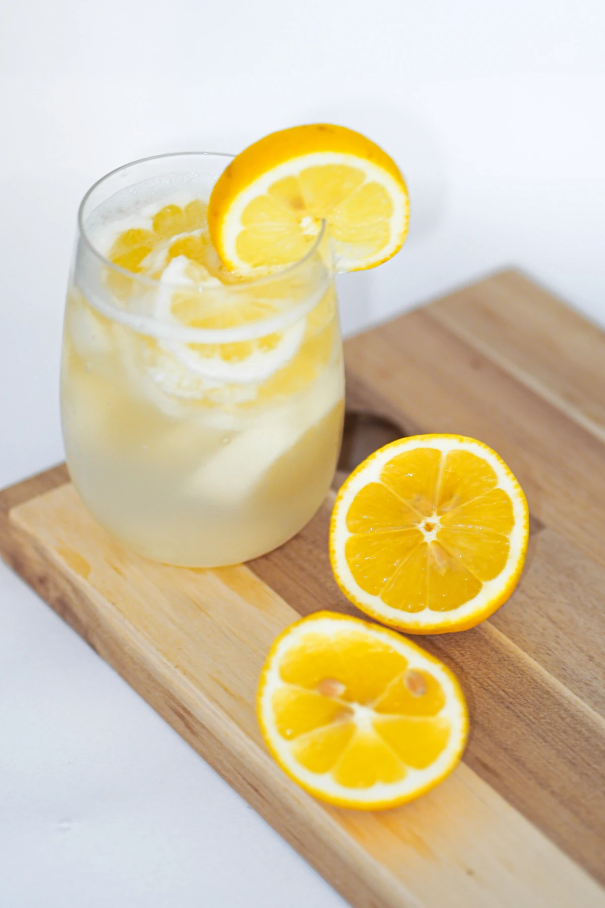 lemon water benefits lemon water with slices
