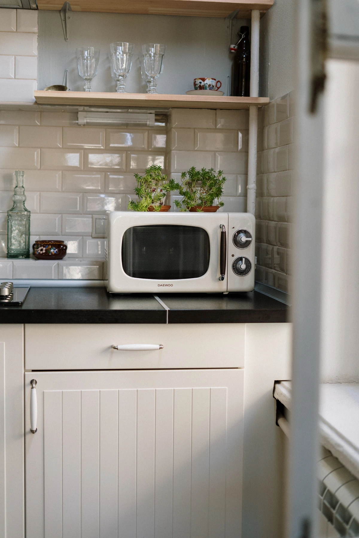 white microwave on countertop