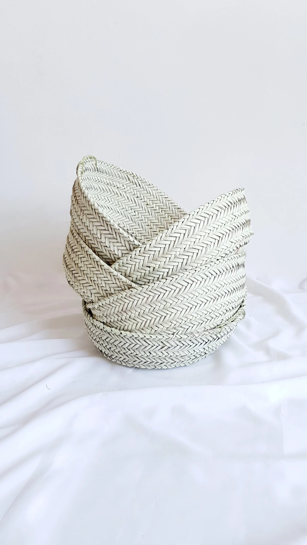 how to organize snacks woven baskets on top of one another