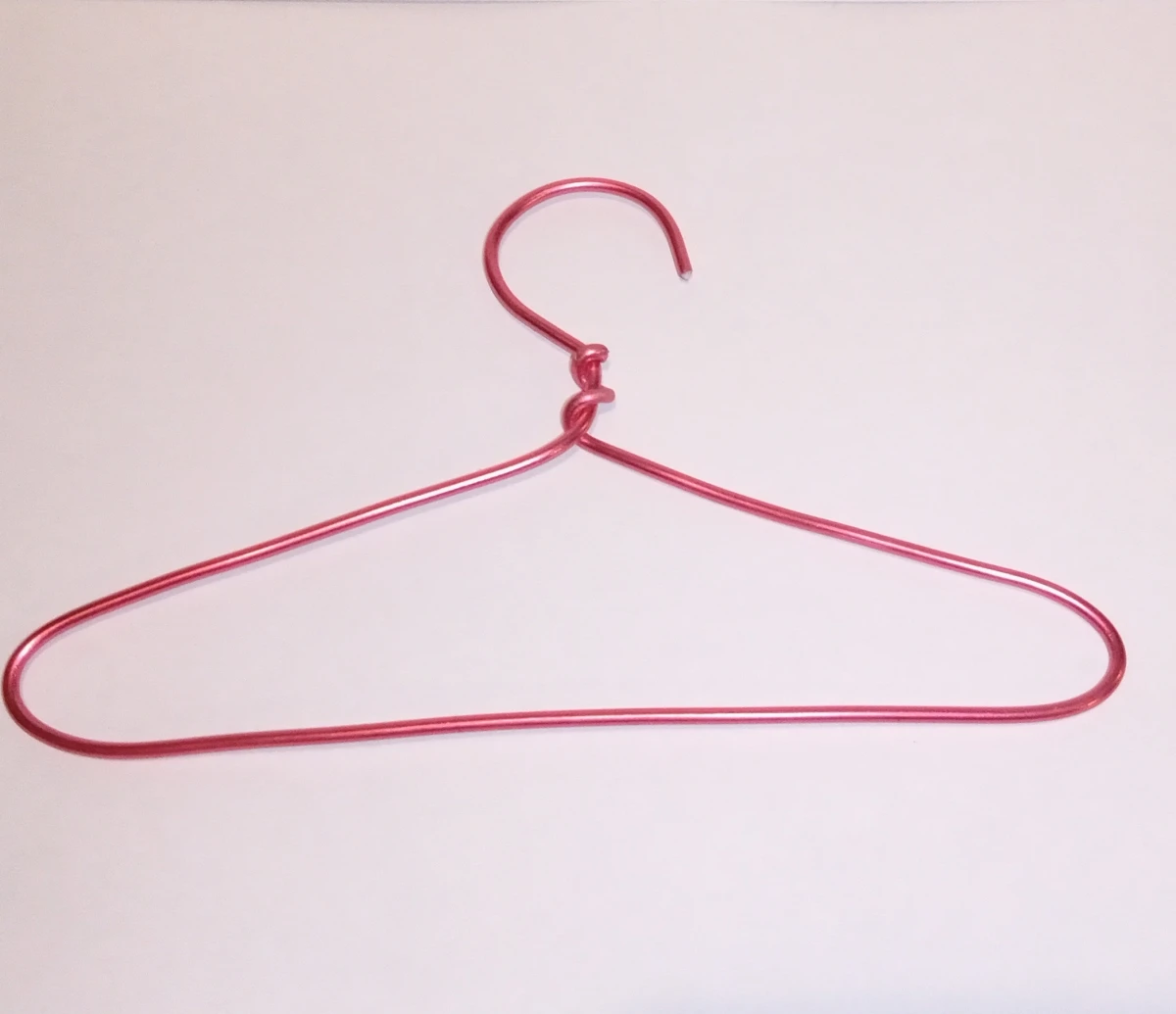 pink wire coat hanger