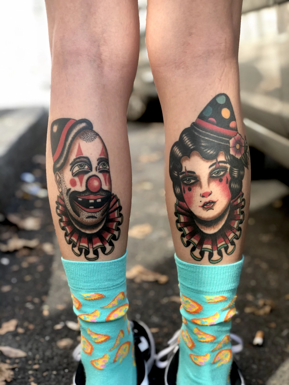 tattoos with hidden meaning clown tattoo on legs