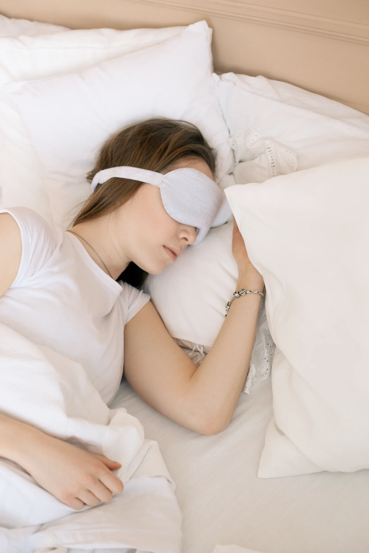 woman sleeping with eye mask