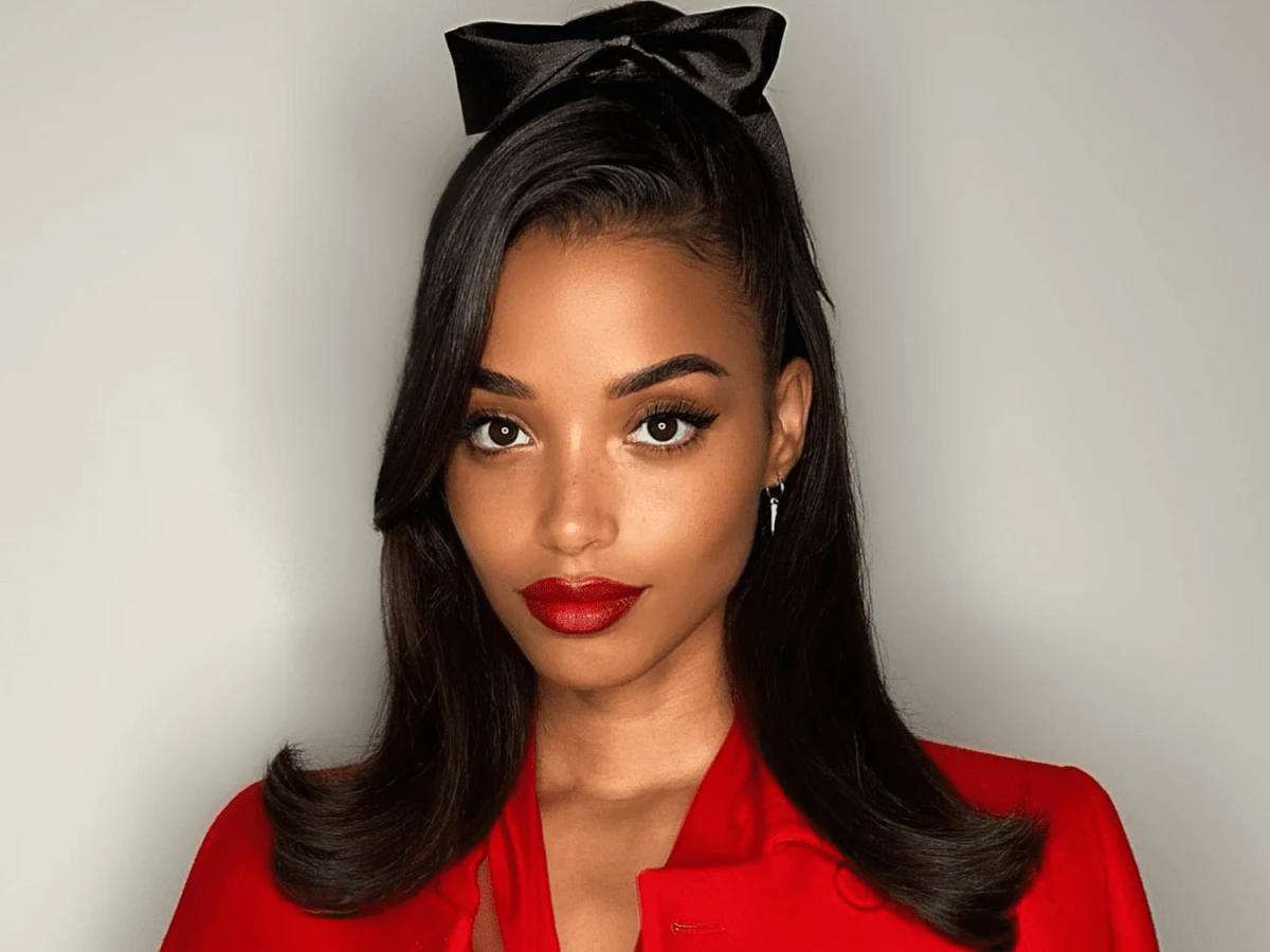 50s hairstyle sleek hair with bow
