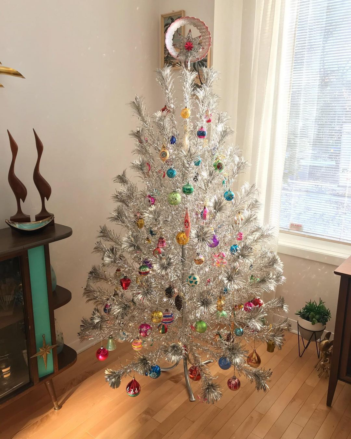 aluminum christmas tree with metallic ornaments