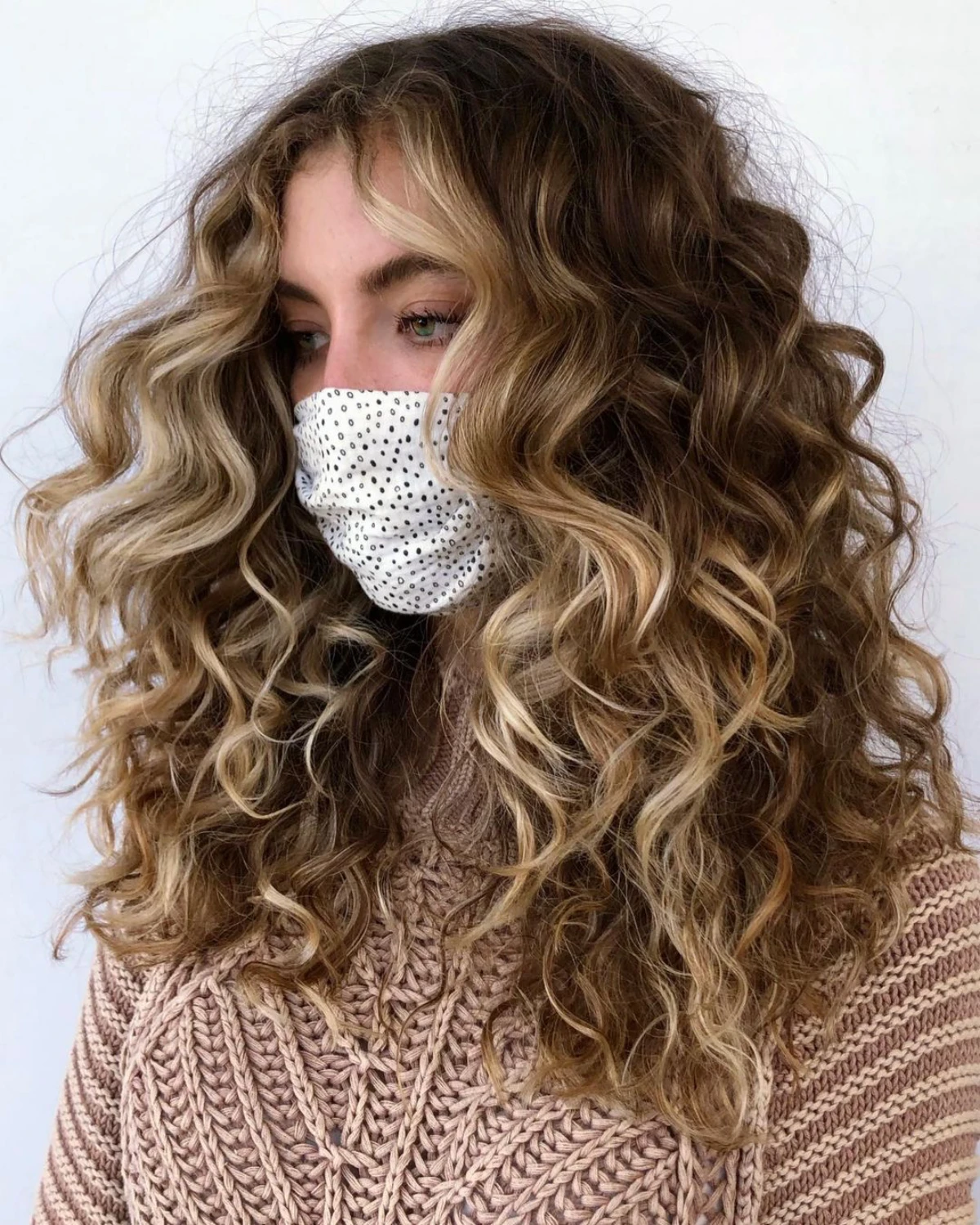 girl with mask and hair highlights