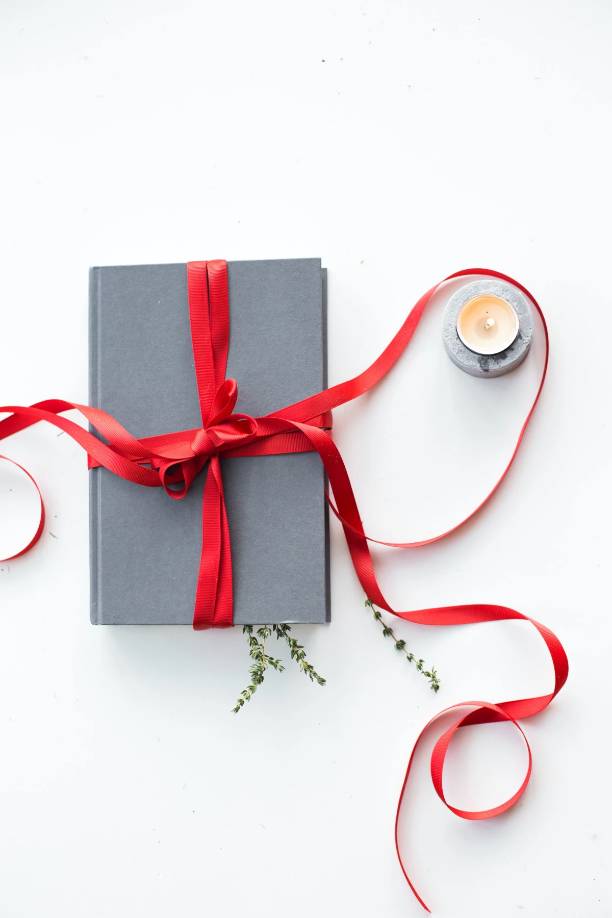 how to wrap a book as a gift book with a red bow