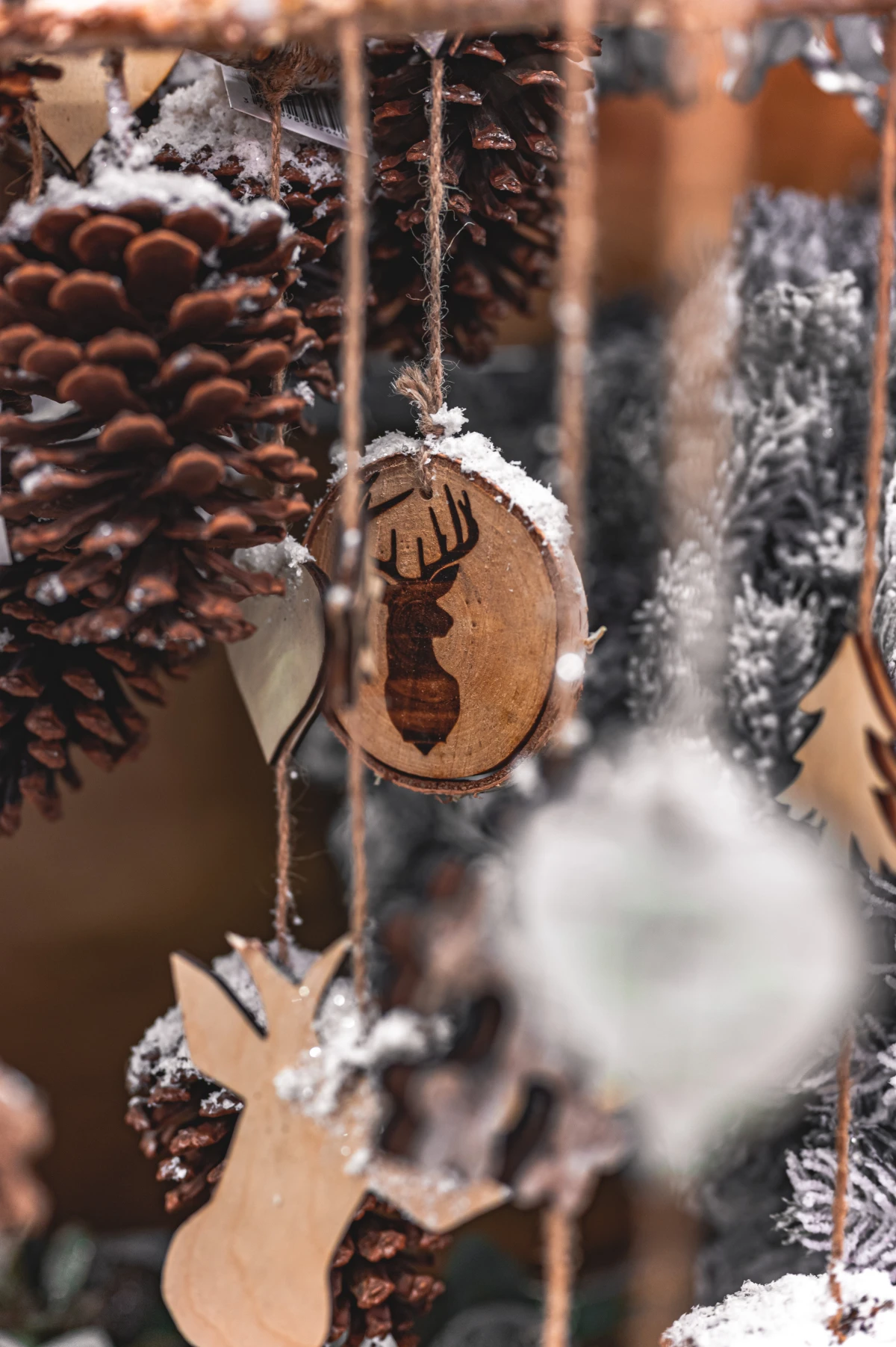 non christmas winter decorations pine cones and wooden decoration