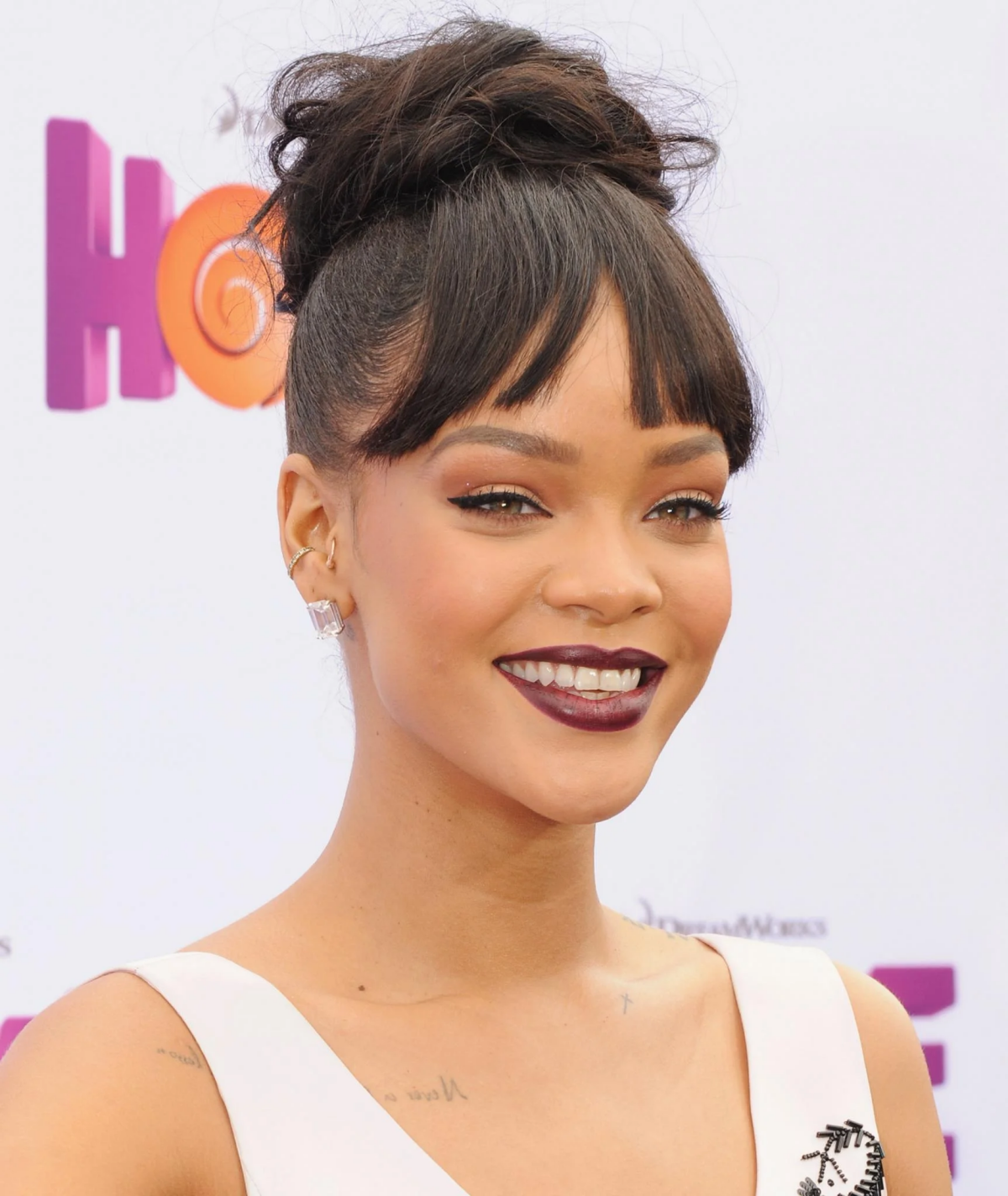 updos with bangs for medium length hair rihanna.jpg