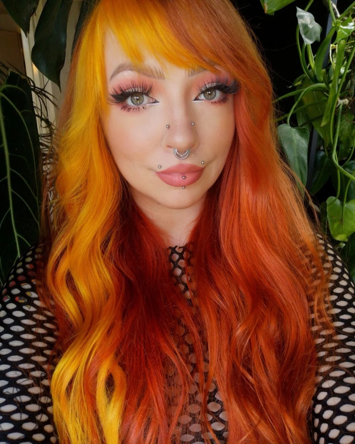 1 angel bites piercings woman with red orange hair